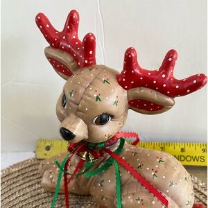Ceramic hand painted reindeer 7 in tall 9in wide. Sitting